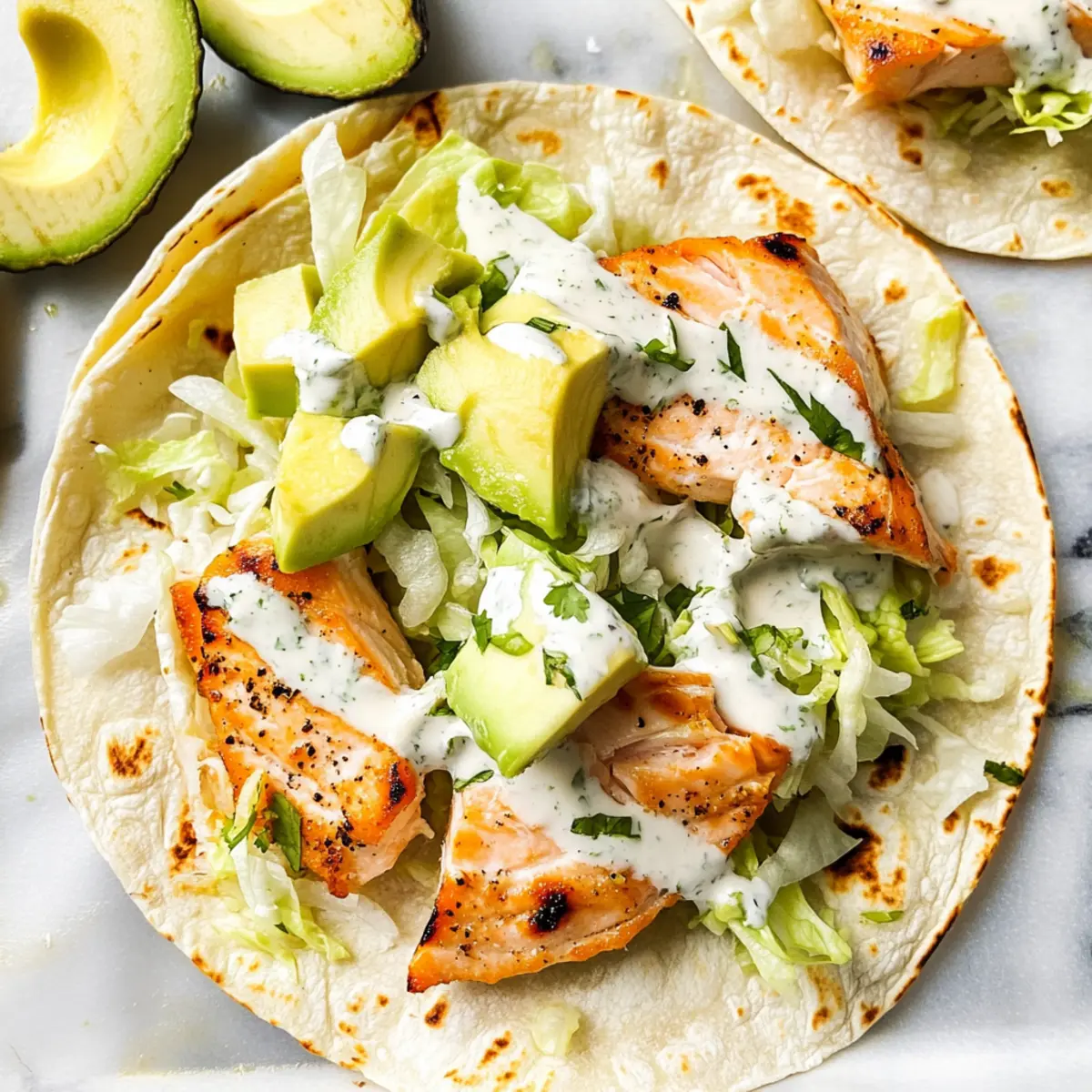 Baked Salmon Tacos with Creamy Cilantro Lime Bliss